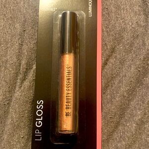 Beauty essential lip, gloss, color luminous, never used